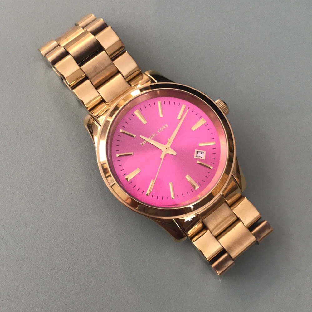 Michael Kors gold watch with pink face